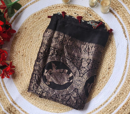 Ajrakh print Dola silk Sarees-  Stripes and Elephant zari border Black